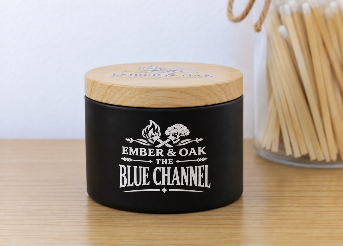     The Blue Channel 8oz luxury scented candle with wooden lid and Ember & Oak branding