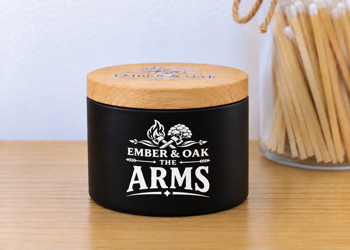     The Arms 8oz luxury scented candle with wooden lid and Ember & Oak branding