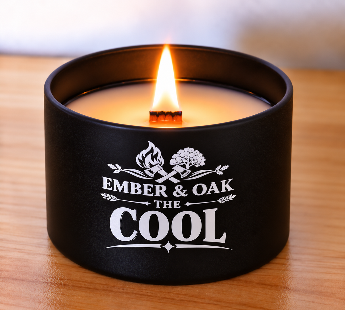     The Cool 8oz luxury scented candle burning with wooden wick and Ember & Oak branding