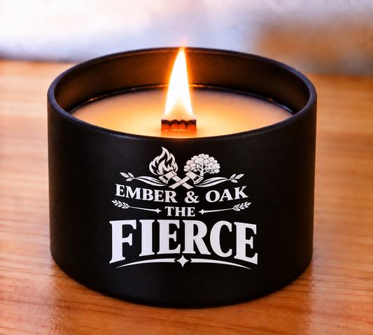    The Fierce 8oz luxury scented candle burning with wooden wick and Ember & Oak branding