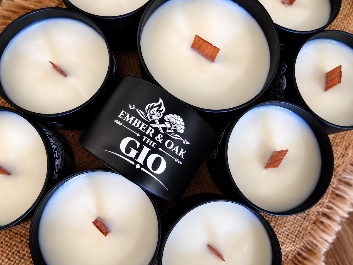 The Gio luxury candle surrounded by multiple Ember & Oak candles
