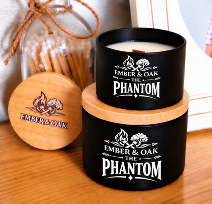     The Phantom luxury candle with wooden lid displayed alongside Ember & Oak packaging and accessories
