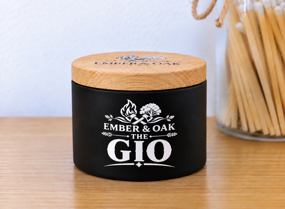 The Gio luxury scented candle with wooden lid and Ember & Oak branding