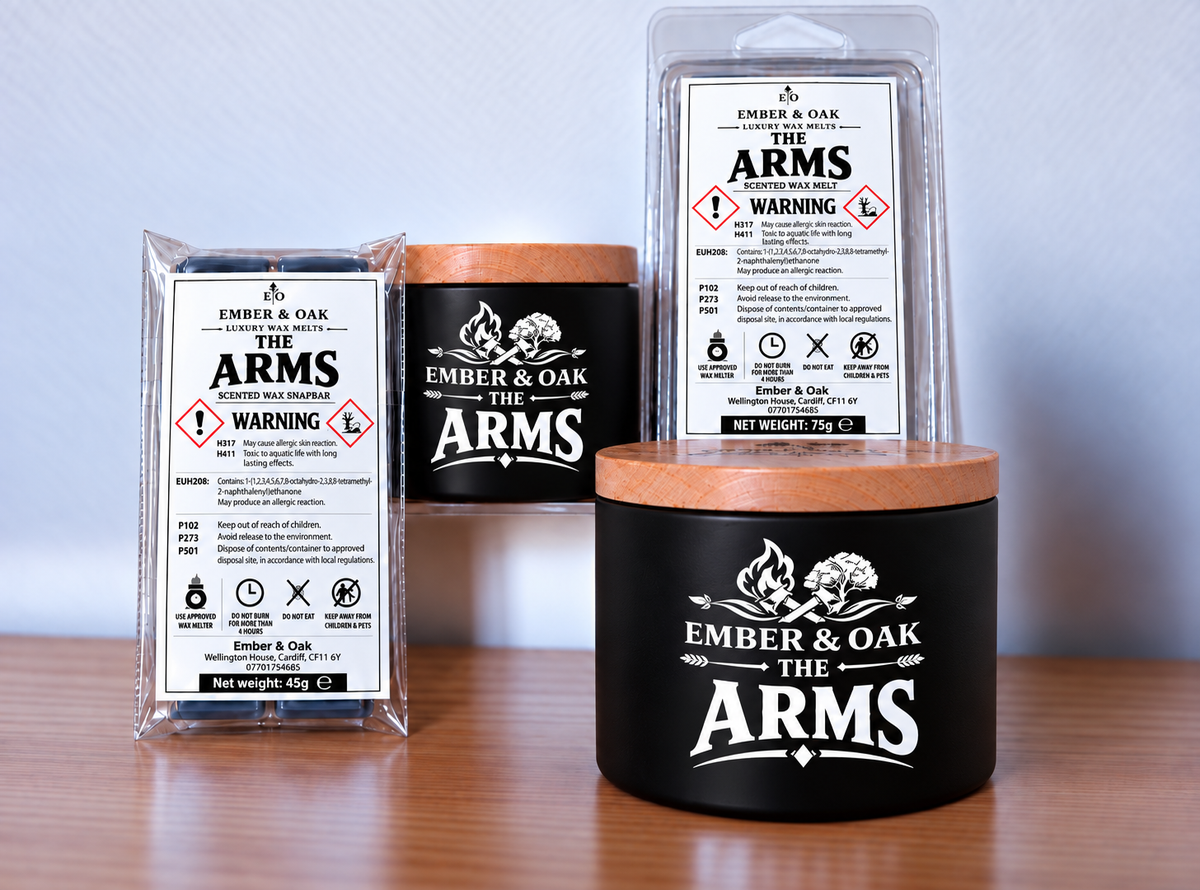     The Arms candle, wax melt and snap bar displayed together with Ember & Oak packaging