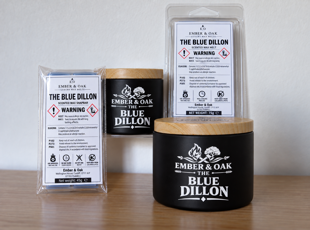     The Blue Dillon candle, wax melt and snap bar displayed together with Ember & Oak packaging