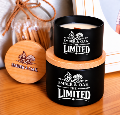     The Limited luxury candle with wooden lid displayed alongside Ember & Oak packaging and accessories