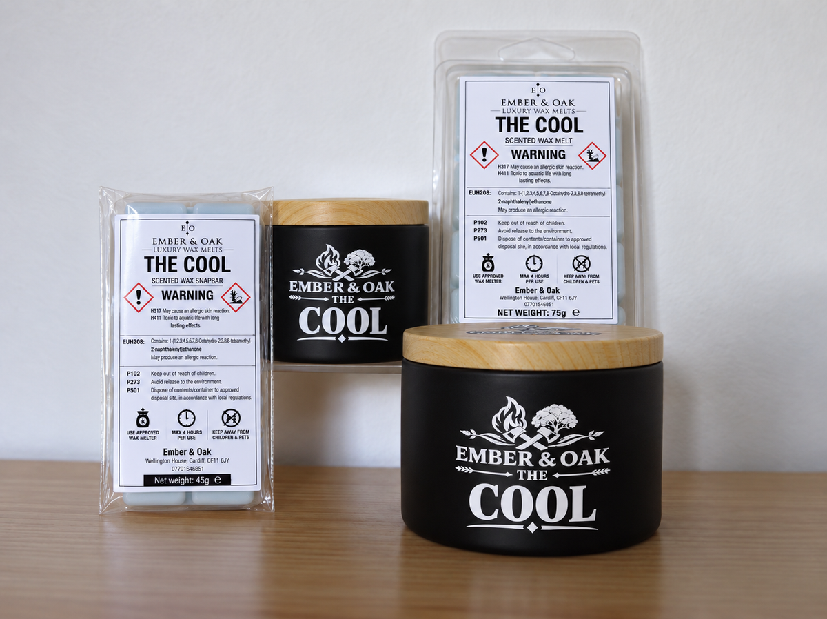     The Cool candle, wax melt and snap bar displayed together with Ember & Oak packaging