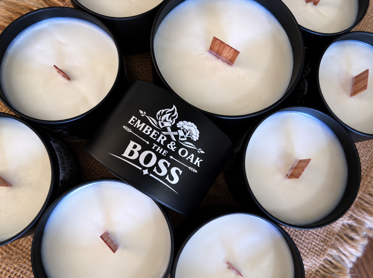     The Boss luxury candle surrounded by multiple Ember & Oak candles