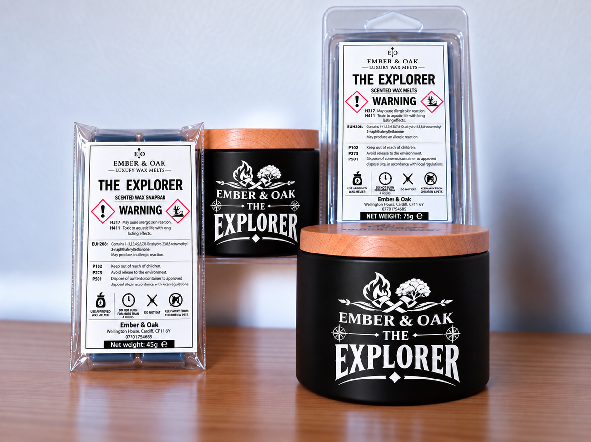     The Explorer candle, wax melt and snap bar displayed together with Ember & Oak packaging