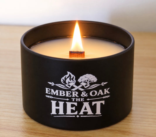     The Heat 8oz luxury scented candle burning with wooden wick and Ember & Oak branding
