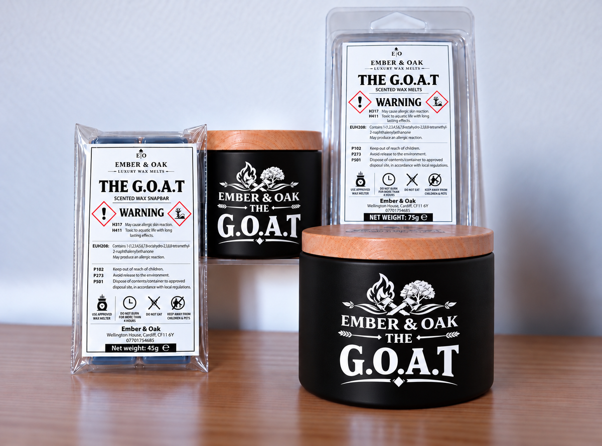    The G.O.A.T candle, wax melt and snap bar displayed together with Ember & Oak packaging