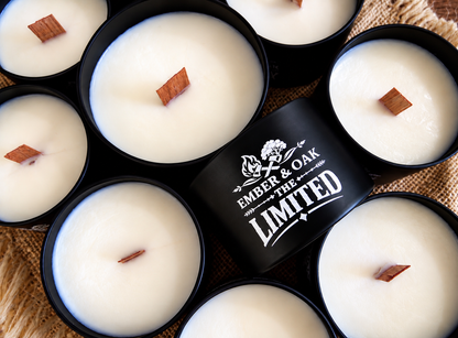     The Limited luxury candle surrounded by multiple Ember & Oak candles
